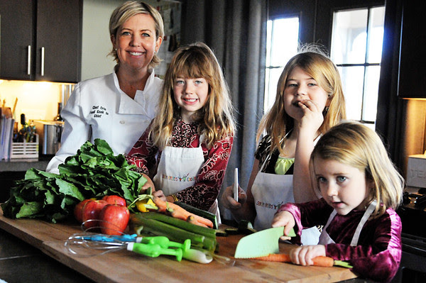 erin fletter and her daughters making a sticky fingers cooking recipe