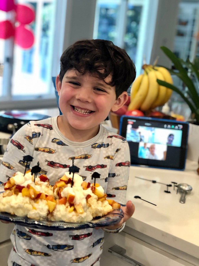 boy who just finished a sticky fingers cooking private online cooking class